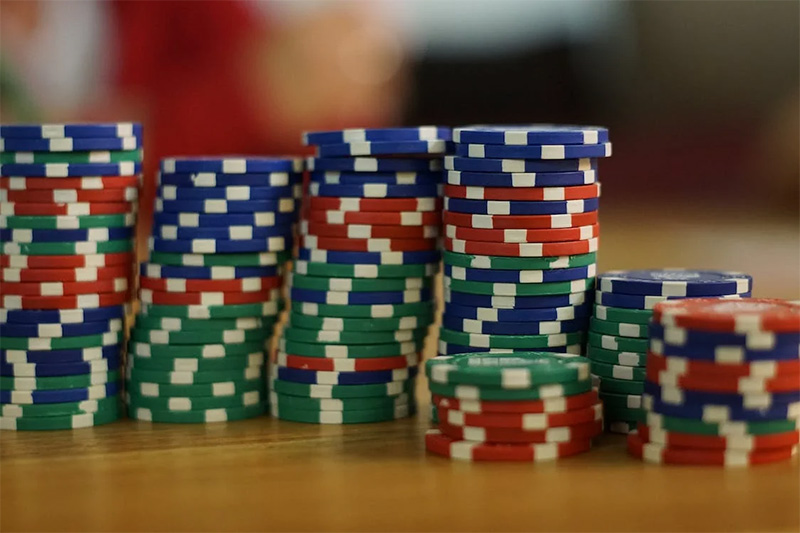 On the playing table there are red, green and blue chips for roulette game